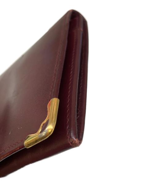 Cartier（カルティエ）Cartier (カルティエ) 二つ折り長財布 ボルドーの古着・服飾アイテム