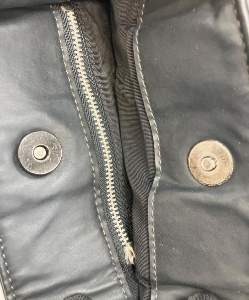 Jean Paul GAULTIER（ジャンポールゴルチェ）Jean Paul GAULTIER (ジャンポールゴルチェ) メタルプレートコーティングミニリュック ブラックの古着・服飾アイテム