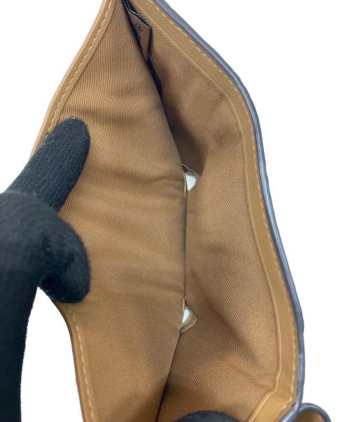 COACH（コーチ）COACH (コーチ) エッセンシャルミニトライフォールドウォレット・フローラルプリント ブラック×アイボリーの古着・服飾アイテム