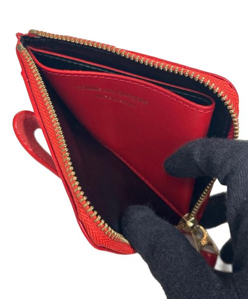 COMME des GARCONS（コムデギャルソン）COMME des GARCONS (コムデギャルソン) BIG BOW ZIP AROUND WALLET(ビッグボウジップアラウンドウォレット) レッドの古着・服飾アイテム
