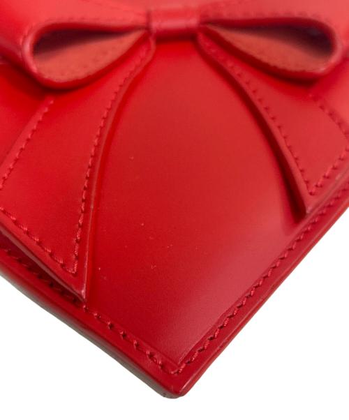 COMME des GARCONS（コムデギャルソン）COMME des GARCONS (コムデギャルソン) BIG BOW ZIP AROUND WALLET(ビッグボウジップアラウンドウォレット) レッドの古着・服飾アイテム