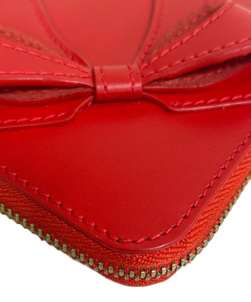 COMME des GARCONS（コムデギャルソン）COMME des GARCONS (コムデギャルソン) BIG BOW ZIP AROUND WALLET(ビッグボウジップアラウンドウォレット) レッドの古着・服飾アイテム