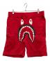 A BATHING APE（アベイシングエイプ）の古着「スウェットハーフパンツ」｜レッド