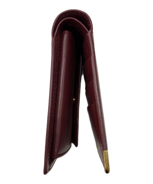 Cartier（カルティエ）Cartier (カルティエ) マストライン　2つ折り財布 ボルドーの古着・服飾アイテム