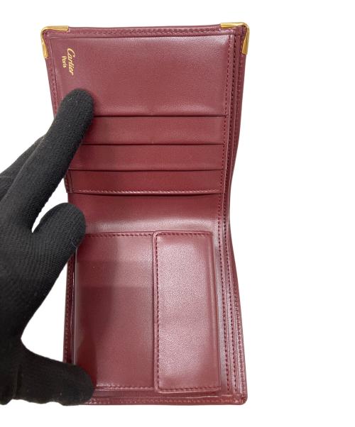 Cartier（カルティエ）Cartier (カルティエ) マストライン　2つ折り財布 ボルドーの古着・服飾アイテム