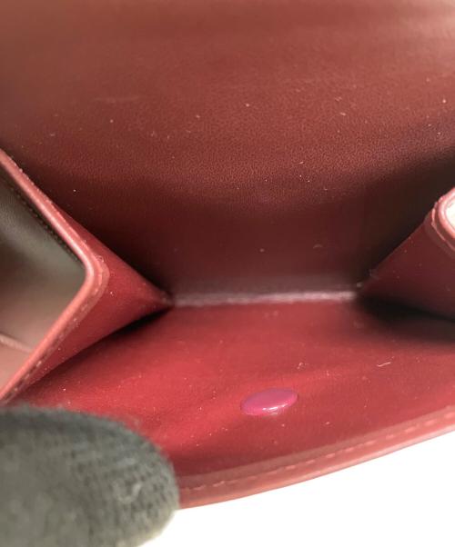 Cartier（カルティエ）Cartier (カルティエ) マストライン　2つ折り財布 ボルドーの古着・服飾アイテム