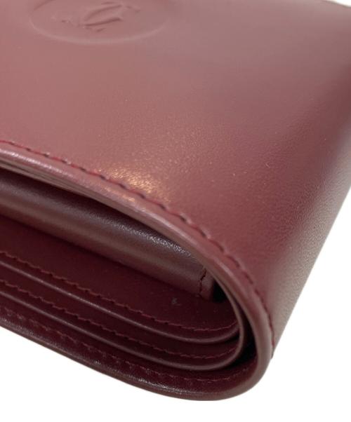 Cartier（カルティエ）Cartier (カルティエ) マストライン　2つ折り財布 ボルドーの古着・服飾アイテム