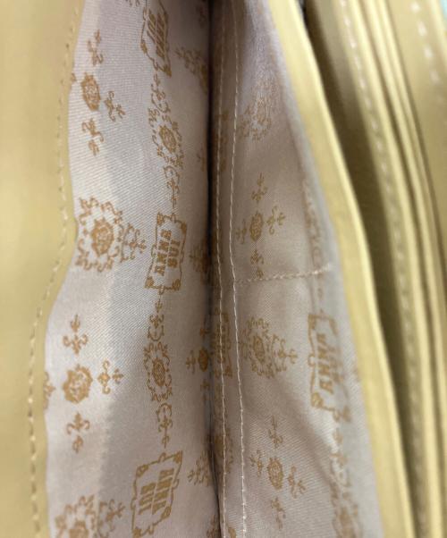 ANNA SUI（アナスイ）ANNA SUI (アナスイ) ラウンドファスナー長財布 黄緑の古着・服飾アイテム