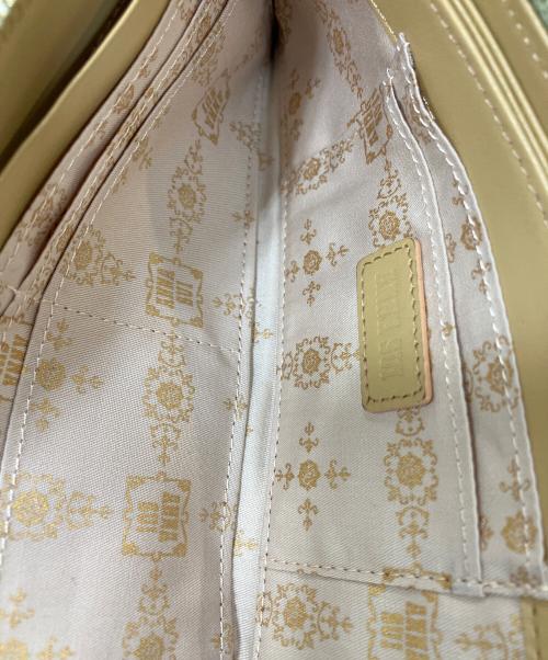 ANNA SUI（アナスイ）ANNA SUI (アナスイ) ラウンドファスナー長財布 黄緑の古着・服飾アイテム