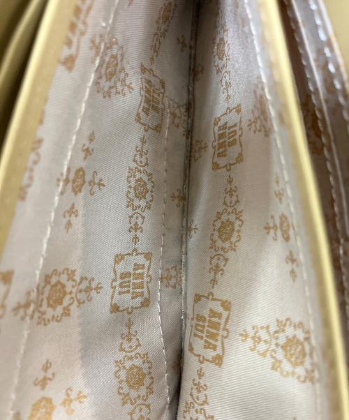 ANNA SUI（アナスイ）ANNA SUI (アナスイ) ラウンドファスナー長財布 黄緑の古着・服飾アイテム