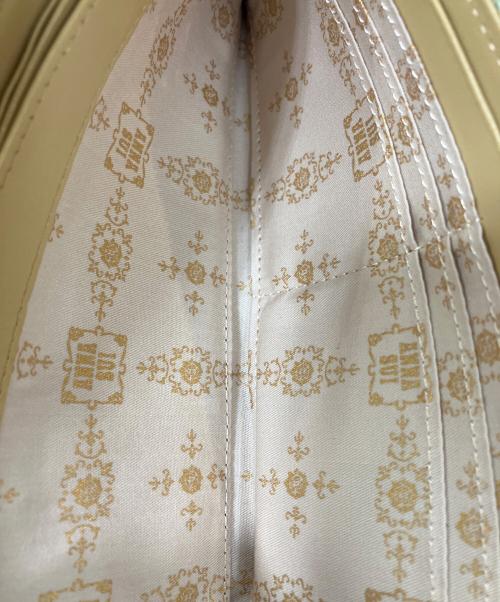 ANNA SUI（アナスイ）ANNA SUI (アナスイ) ラウンドファスナー長財布 黄緑の古着・服飾アイテム