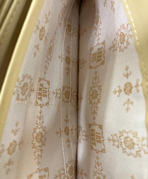ANNA SUI（アナスイ）ANNA SUI (アナスイ) ラウンドファスナー長財布 黄緑の古着・服飾アイテム
