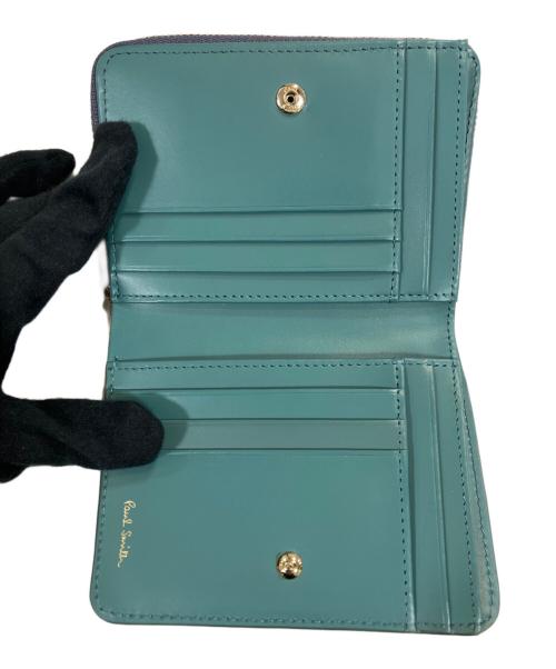 PAUL SMITH（ポールスミス）PAUL SMITH (ポールスミス) ミックスドゥードゥルラウンドファスナー2つ折り財布 ブルーの古着・服飾アイテム