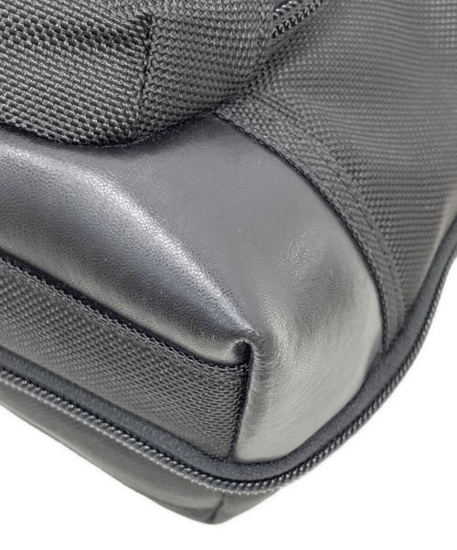 TUMI（トゥミ）TUMI (トゥミ) イースト・ウエスト・バッグ ブラックの古着・服飾アイテム