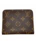 LOUIS VUITTON（ルイ ヴィトン）の古着「2つ折り財布」｜ブラウン×レッド