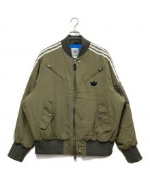 adidas Originals（アディダスオリジナル）の古着「ニュー パデッドジャケット」｜カーキ×ホワイト