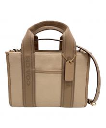 COACH（コーチ）の古着「スミス トート バッグ 24」｜ベージュ