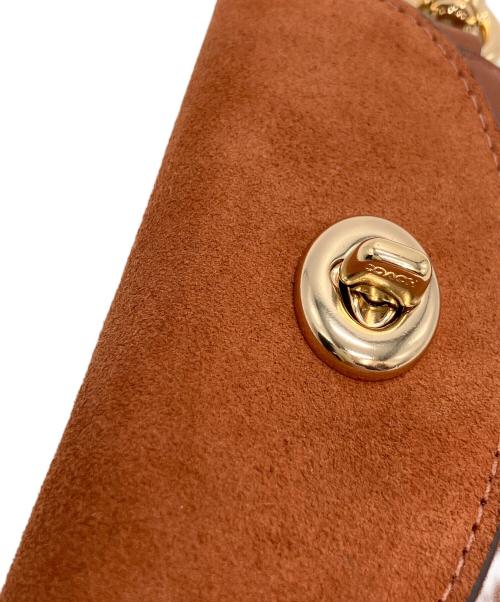 COACH（コーチ）COACH (コーチ) ターンロック式小銭入れ ブラウンの古着・服飾アイテム