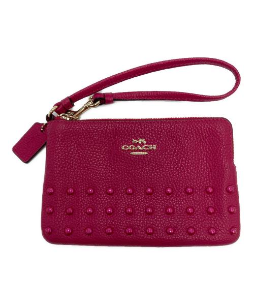 COACH（コーチ）COACH (コーチ) ラッカーリベットコーナー ジップリストレットポーチ ショッキングピンクの古着・服飾アイテム