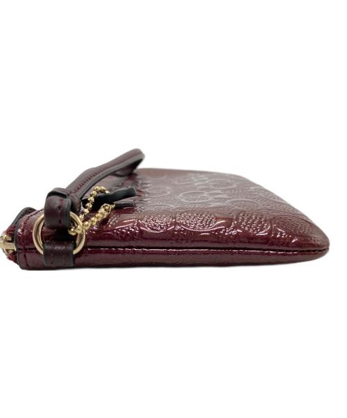 COACH（コーチ）COACH (コーチ) シグネチャーエナメルポール ワインレッドの古着・服飾アイテム