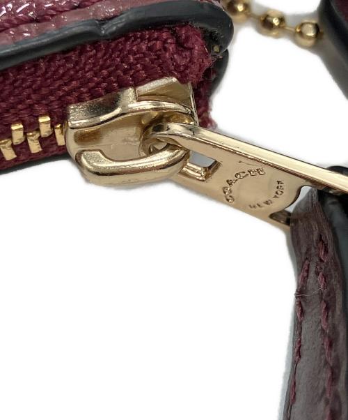 COACH（コーチ）COACH (コーチ) シグネチャーエナメルポール ワインレッドの古着・服飾アイテム