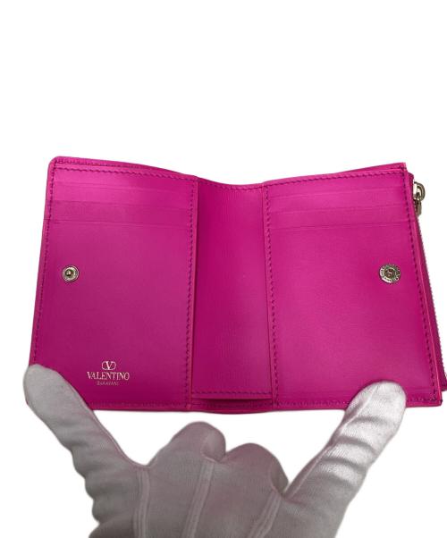 VALENTINO（ヴァレンティノ）VALENTINO (ヴァレンティノ) 2つ折り財布 ショッキングピンクの古着・服飾アイテム