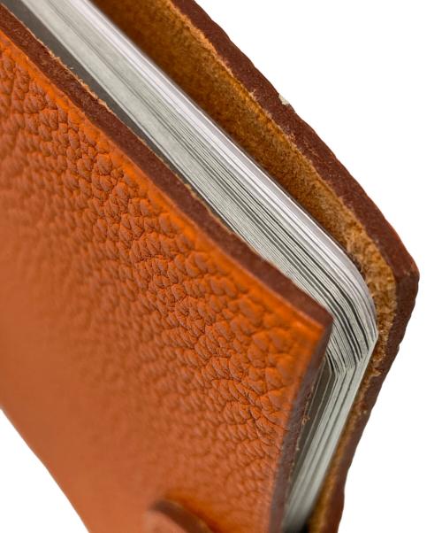 HERMES（エルメス）HERMES (エルメス) 手帳カバー オレンジの古着・服飾アイテム