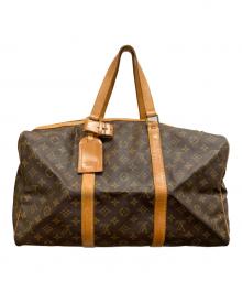 LOUIS VUITTON（ルイ ヴィトン）の古着「トラベルバッグ」｜ブラウン