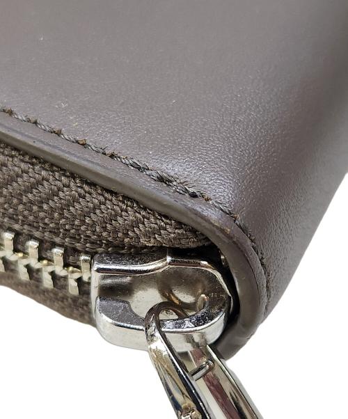 PAUL SMITH（ポールスミス）Paul Smith (ポールスミス) ラウンドファスナー財布 ベージュの古着・服飾アイテム