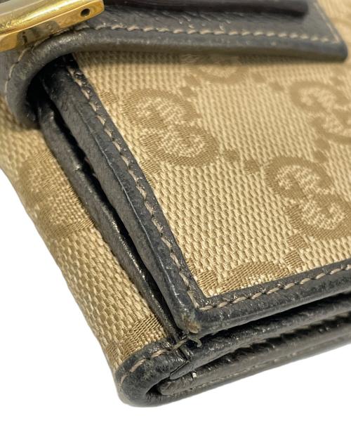 GUCCI（グッチ）GUCCI (グッチ) 2つ折り財布 ブラウンの古着・服飾アイテム