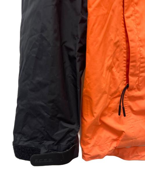 F.C.Real Bristol（エフシーレアルブリストル）F.C.Real Bristol (エフシーレアルブリストル) フーデッドジャケット ブラック×オレンジ サイズ:Mの古着・服飾アイテム