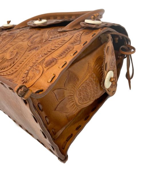 cawing tribes（カービングトライブス）cawing tribes (カービングトライブス) ハンドバッグ ブラウンの古着・服飾アイテム