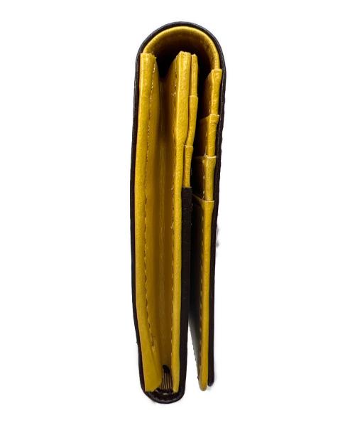 ultima tokyo（ウルティマトーキョー）ultima tokyo (ウルティマトーキョー) 長財布 ブラウン×イエローの古着・服飾アイテム