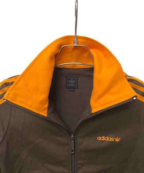 adidas（アディダス）adidas (アディダス) トラックジャケット ブラウン×オレンジ サイズ:Mの古着・服飾アイテム