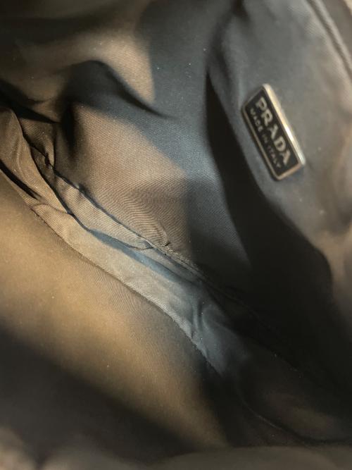 PRADA（プラダ）PRADA (プラダ) ハンドポーチ グレーの古着・服飾アイテム