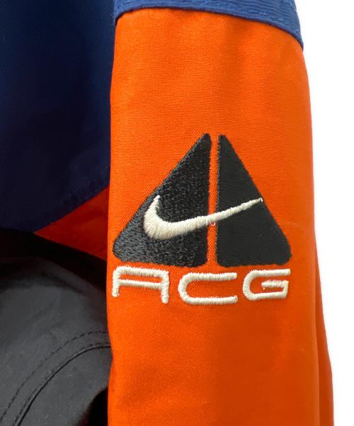 NIKE ACG（ナイキエーシージー）NIKE ACG (ナイキエーシージー) ナイロンジャケット オレンジ×ブルー サイズ:ＸＬの古着・服飾アイテム