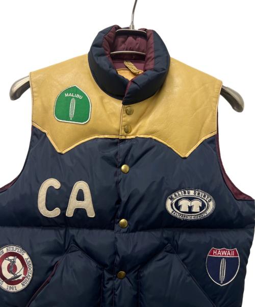 RockyMountainFeatherBed（ロッキーマウンテンフェザーベッド）RockyMountainFeatherBed (ロッキーマウンテンフェザーベッド) MALIBU SHIRTS (マリブシャツ) ダウンベスト ネイビー×ベージュ サイズ:３８の古着・服飾アイテム