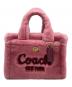 COACH（コーチ）の古着「カーゴ トート バッグ 20・シアリング」｜ピンク