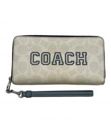 COACH（コーチ）の古着「Long Zip Around Wallet In Signature Canvas With Varsity Motif(ロングジップアラウンドウォレット インシグネチャーキャンバス ウィズヴァーシティモチーフ)」｜ホワイト×ネイビー