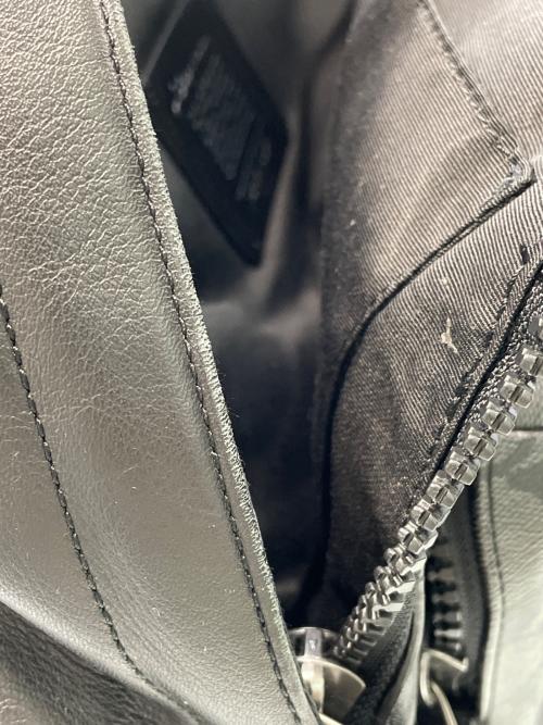 COACH（コーチ）COACH (オールドコーチ) DISNEY (ディズニー) リュック ブラックの古着・服飾アイテム