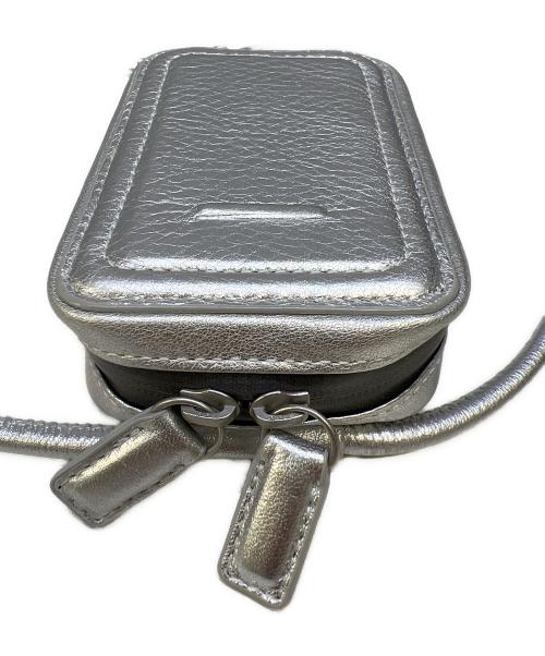 objects.io（オブジェクトアイオー）objects.io (オブジェクトアイオー) ストラップ付マイクロバッグ シルバーの古着・服飾アイテム