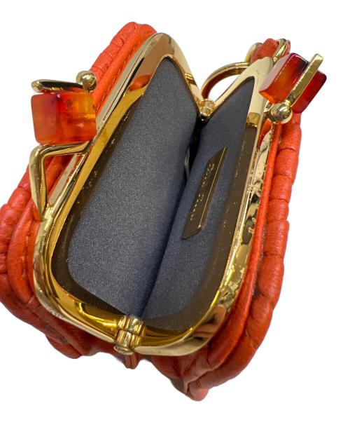 MIU MIU（ミュウミュウ）MIU MIU (ミュウミュウ) マテラッセ チャーム オレンジの古着・服飾アイテム