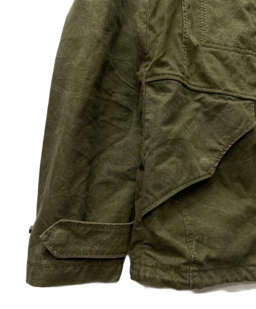 ISAMU KATAYAMA BACKLASH（イサムカタヤマ・バックラッシュ）ISAMU KATAYAMA BACKLASH (イサムカタヤマ・バックラッシュ) ミリタリージャケット カーキ サイズ:Ｌの古着・服飾アイテム