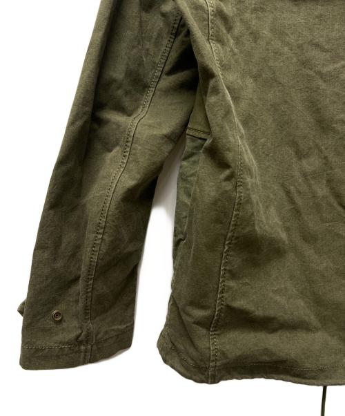 ISAMU KATAYAMA BACKLASH（イサムカタヤマ・バックラッシュ）ISAMU KATAYAMA BACKLASH (イサムカタヤマ・バックラッシュ) ミリタリージャケット カーキ サイズ:Ｌの古着・服飾アイテム