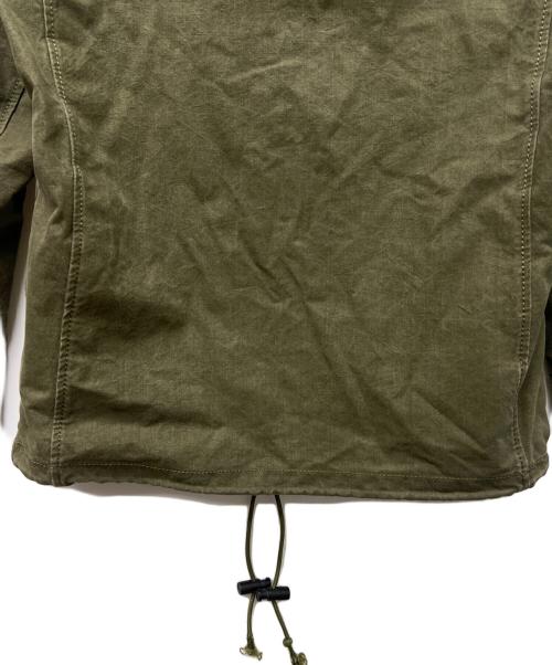 ISAMU KATAYAMA BACKLASH（イサムカタヤマ・バックラッシュ）ISAMU KATAYAMA BACKLASH (イサムカタヤマ・バックラッシュ) ミリタリージャケット カーキ サイズ:Ｌの古着・服飾アイテム