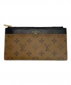 LOUIS VUITTONルイ ヴィトン）の古着「モノグラム・リバース スリム パース」｜ベージュ×ブラック