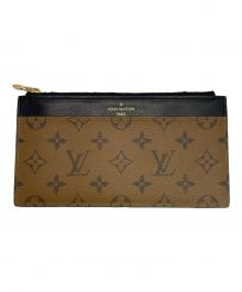 LOUIS VUITTON（ルイ ヴィトン）の古着「モノグラム・リバース スリム パース」｜ベージュ×ブラック