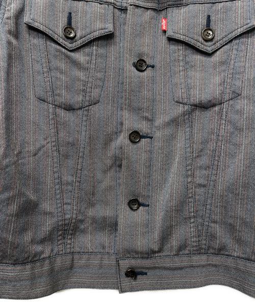 COMME des GARCONS JUNYA WATANABE MAN（コム デ ギャルソン ジュンヤ ワタナベ マン）COMME des GARCONS JUNYA WATANABE MAN (コム デ ギャルソン ジュンヤ ワタナベ マン) LEVI'S (リーバイス) デニムトラッカージャケット インディゴ サイズ:Ｌの古着・服飾アイテム