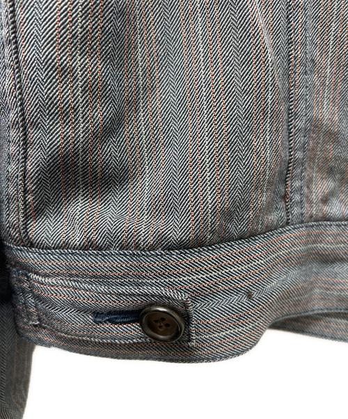 COMME des GARCONS JUNYA WATANABE MAN（コム デ ギャルソン ジュンヤ ワタナベ マン）COMME des GARCONS JUNYA WATANABE MAN (コム デ ギャルソン ジュンヤ ワタナベ マン) LEVI'S (リーバイス) デニムトラッカージャケット インディゴ サイズ:Ｌの古着・服飾アイテム