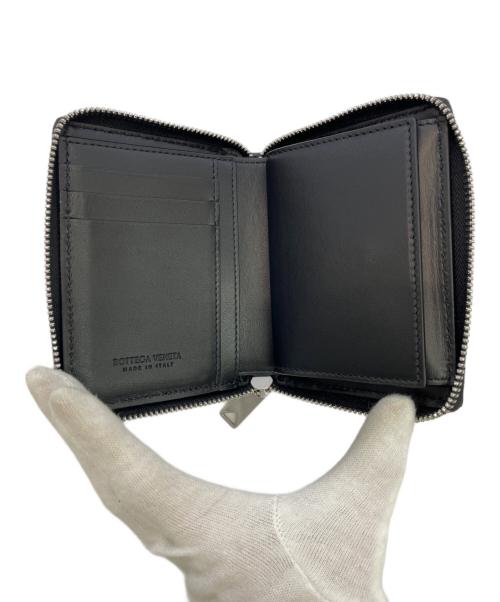 BOTTEGA VENETA（ボッテガベネタ）BOTTEGA VENETA (ボッテガベネタ) 2つ折り財布 ブラックの古着・服飾アイテム